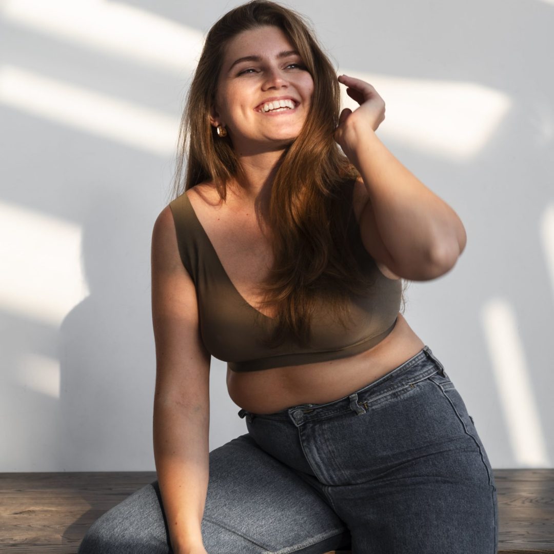 young-beautiful-plump-woman-loving-her-body-min-scaled.jpg